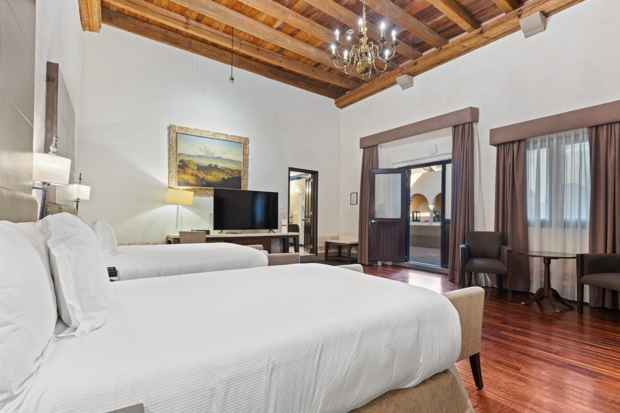 Hotel Quinta Real Puebla de Zaragoza Esterno foto A room at the hotel