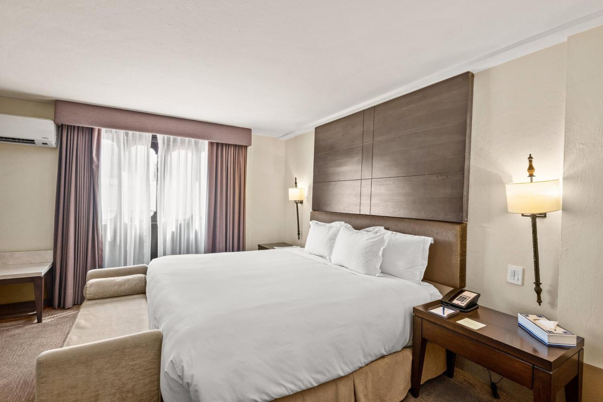 Hotel Quinta Real Puebla de Zaragoza Esterno foto A bedroom at the hotel